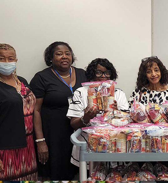 group of Lions Club members with supplies 